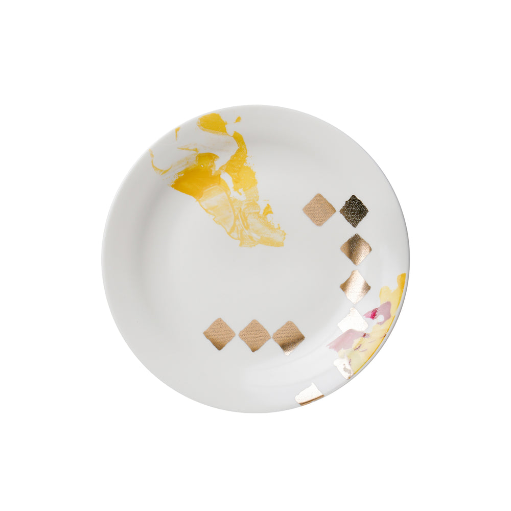
                  
                    dot design with gold on porcelain plate
                  
                